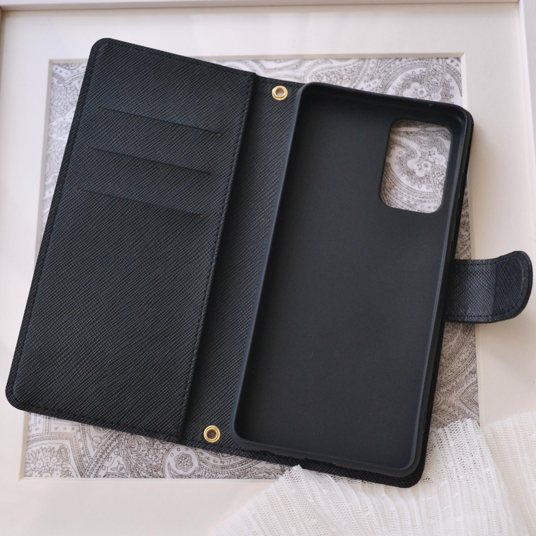 手帳型スマホケース『夜空のきらめき』ピンクとオーロラのクリスタル 漆黒のカバー　ほぼ全機種対応 傷が目立ちにくい型押模様 | 8枚目