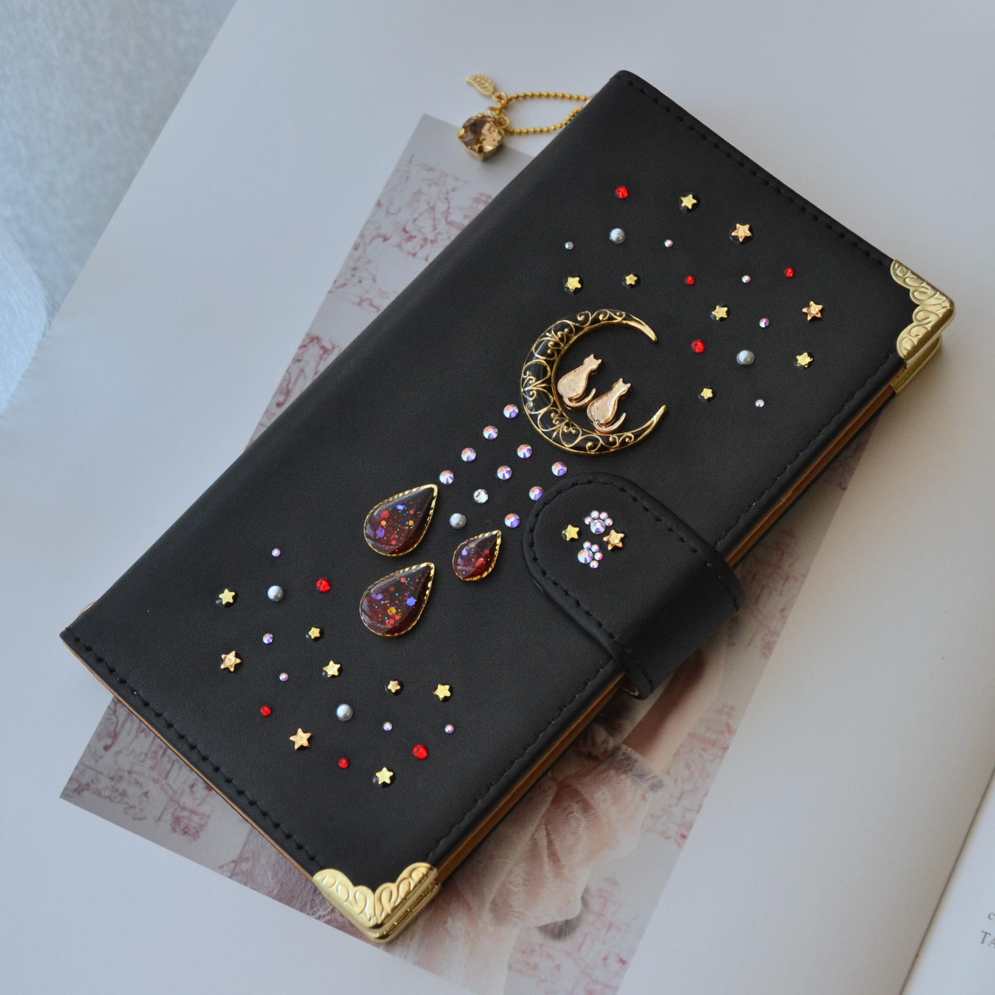 手帳型スマホケース『猫と月のロマンティック』満天の星　赤のしずくver 黒　本革　全機種注文可能