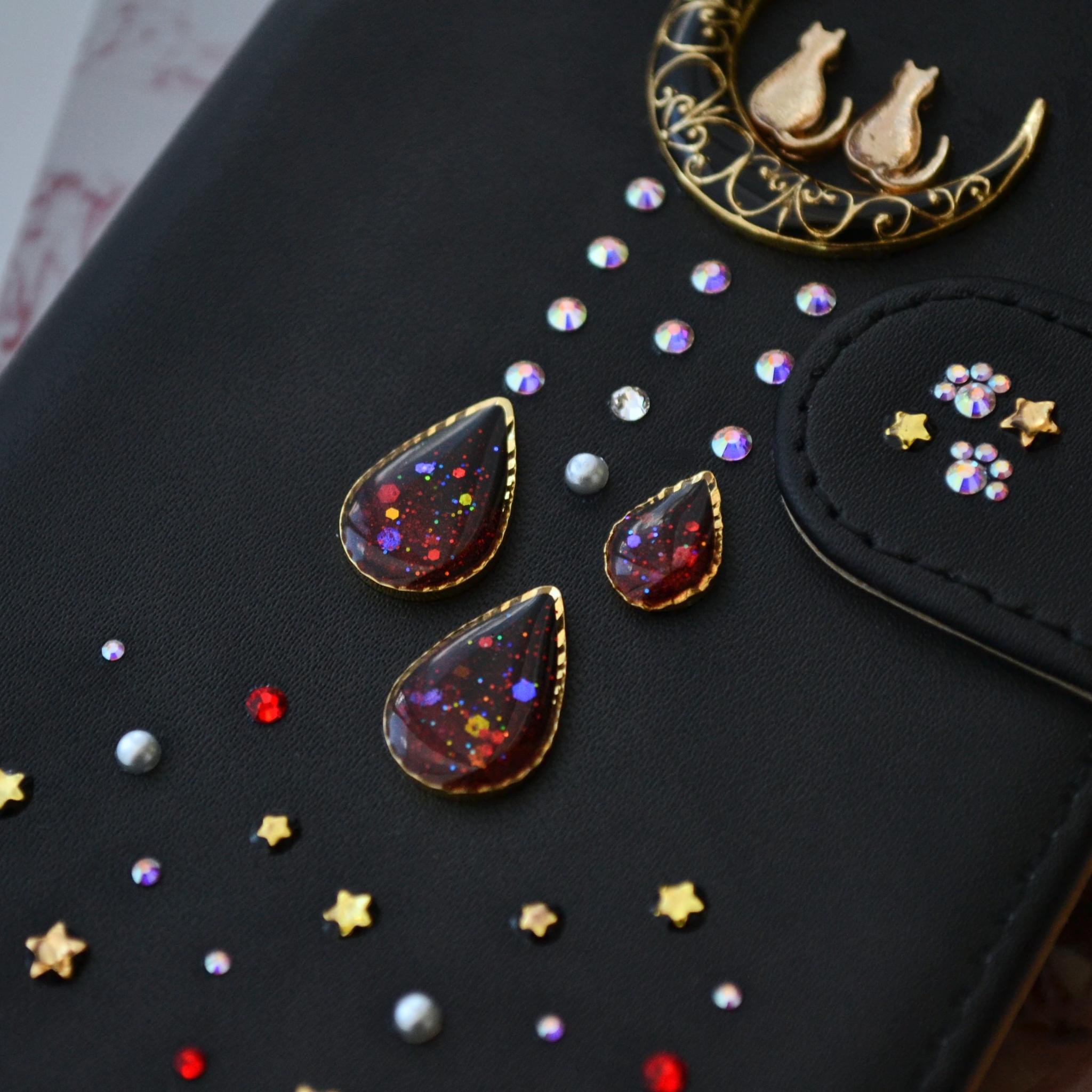 手帳型スマホケース『猫と月のロマンティック』満天の星　赤のしずくver 黒　本革　全機種注文可能 | 3枚目