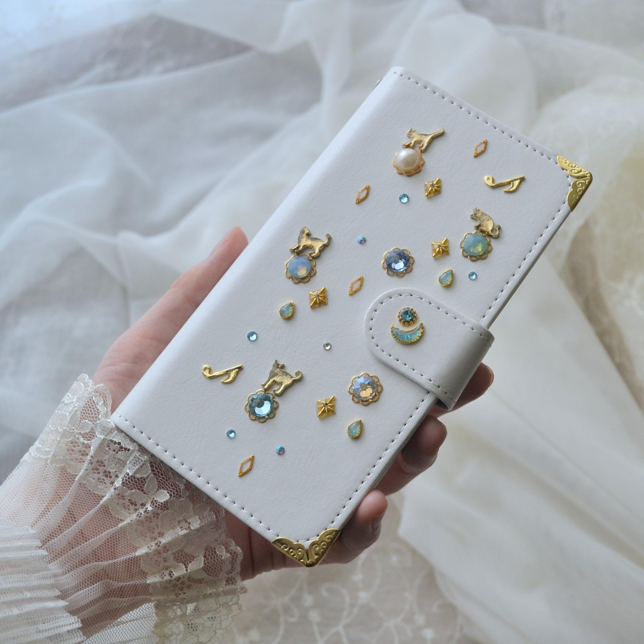 手帳型スマホケース『猫の思い出』白×水色　Kitten Blue デコレーションカバー 全機種対応◎1枚目の画像