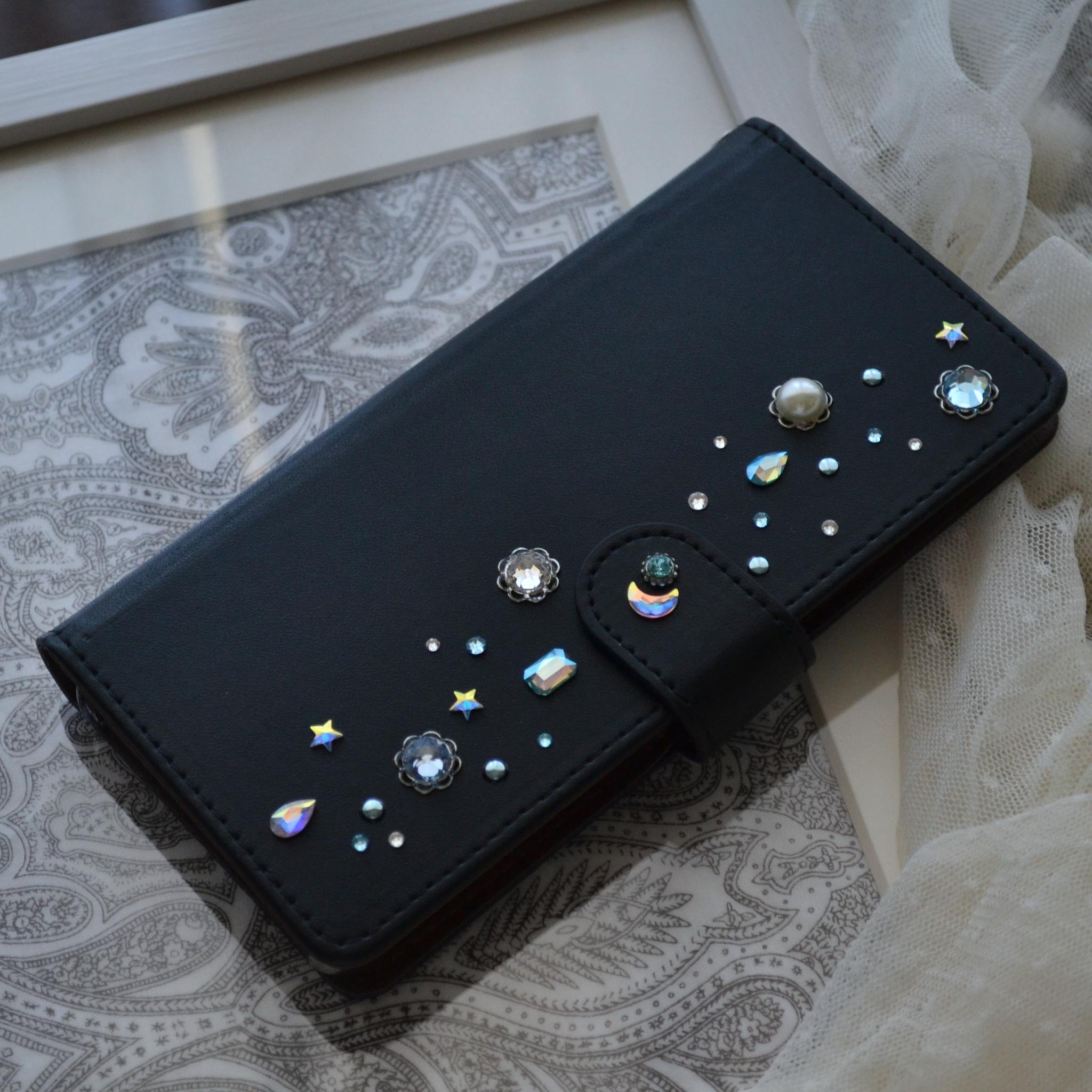 手帳型スマホケース『夜空のきらめき』水色とオーロラのクリスタル 漆黒のカバー　ほぼ全機種対応 | 4枚目